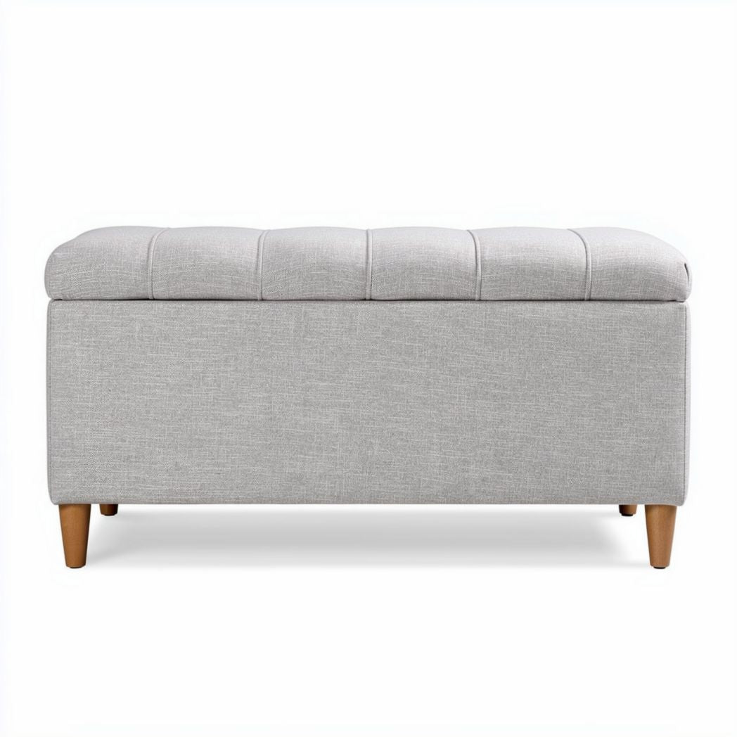 Banco tapizado en tela gris con patas de madera de 100 x 40 x 40cm